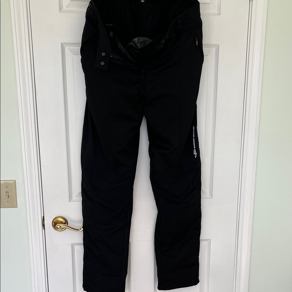 Black women’s Spidi brand waterproof motorcycle pants.